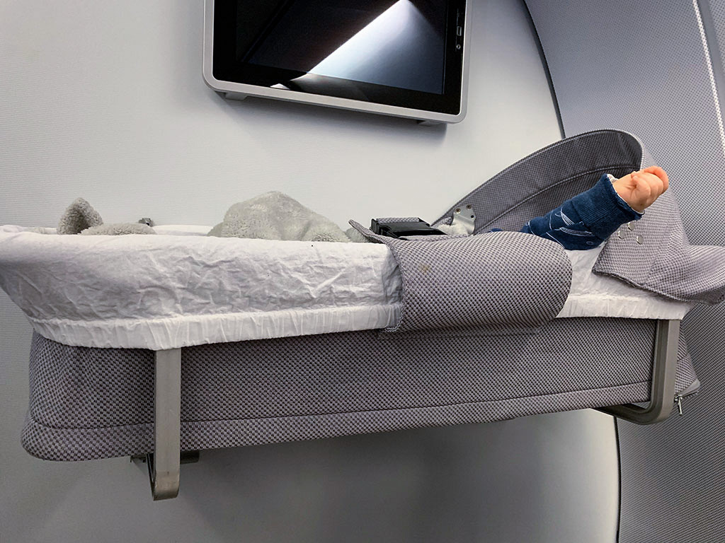 A baby basinet is essential on long-haul flights
