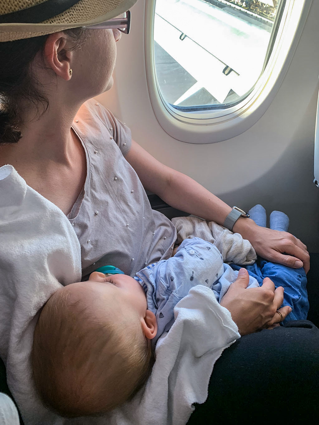 Leo sleeping on a flight