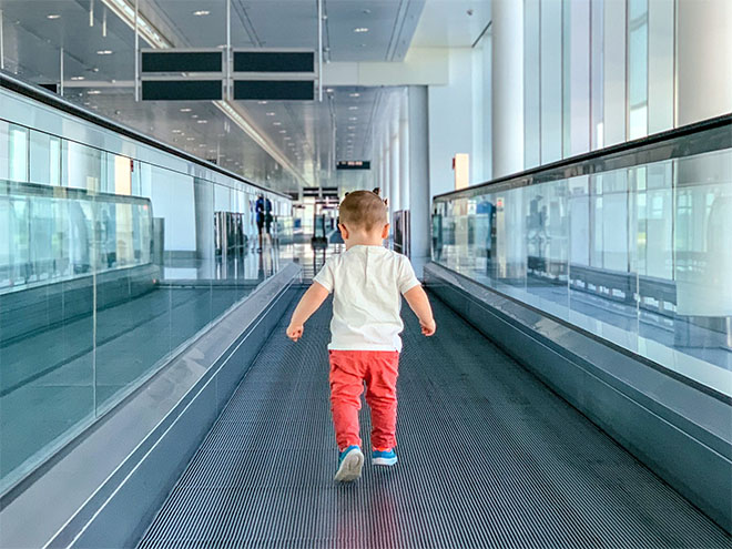 Leo running around the airport
